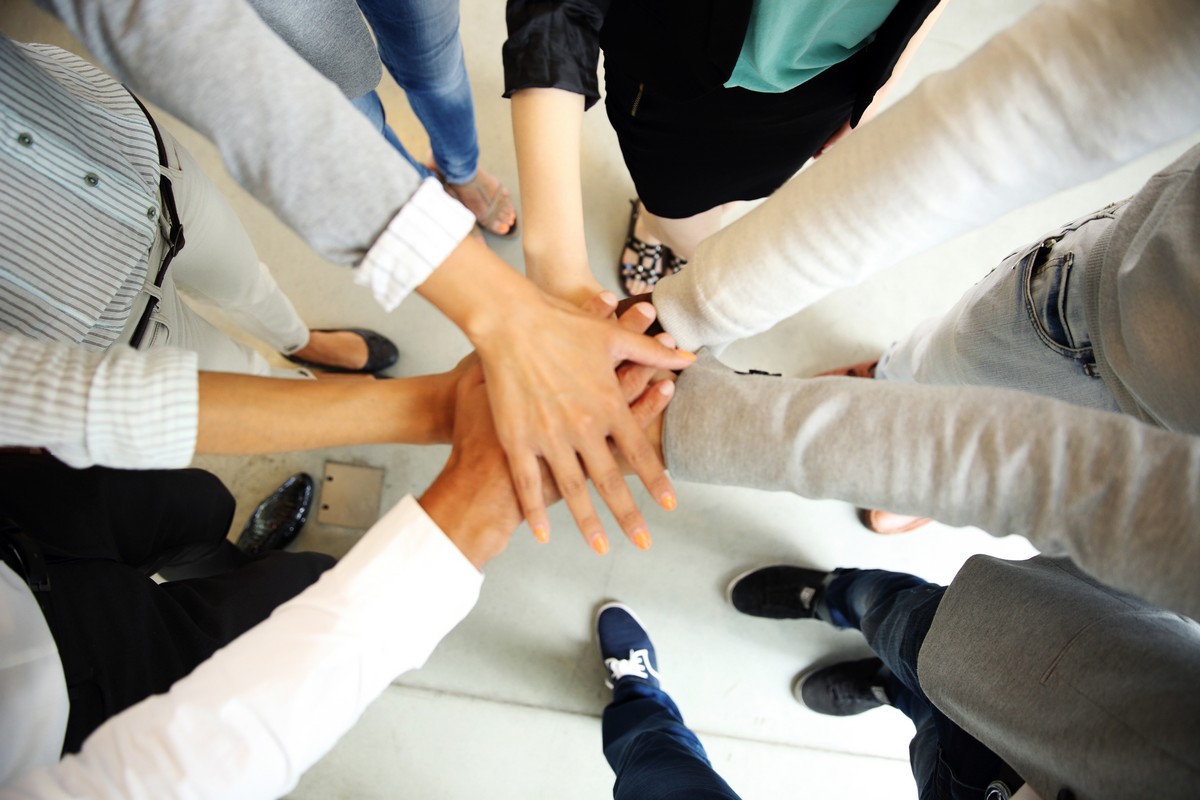 business-people-joining-hands